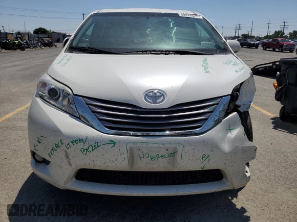 2015 Toyota Sienna XLE with VIN 5TDYK3DC1FS690219, listed as a Copart auction lot 60926525 with 97,879 mi miles and Salvage title. Bid and sale history available at DreamBid. Image 5.
