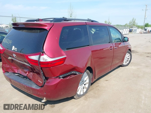 2015 Toyota Sienna XLE with VIN 5TDYK3DC6FS593937, listed as a IAAI auction lot 42168204 with 136,059 mi miles and . Bid and sale history available at DreamBid. Image 4.