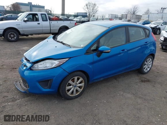 2013 Ford Fiesta SE with VIN 3FADP4EJ6DM130511, listed as a IAAI auction lot 41757636 with 153,664 mi miles. Bid and sale history available at carsss.com. Image 2.