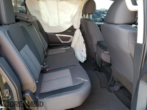 2024 Nissan Titan SV with VIN 1N6AA1EC2RN101063, listed as a Copart auction lot 49879235 with 12,418 mi miles and Salvage title. Bid and sale history available at DreamBid. Image 10.