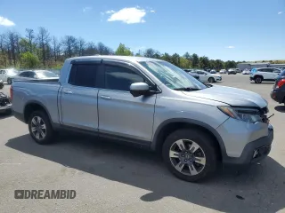 2017 Honda Ridgeline RTL-T with VIN 5FPYK3F65HB012868, listed as a Copart auction lot 57562885 with 115,530 mi miles and Salvage title. Bid and sale history available at DreamBid. Image 4.