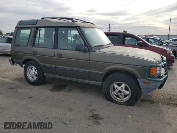 1997 Land Rover Discovery SD z VIN SALJY1249VA705067, wystawiony jako Copart lot #77047054 z przebiegiem 146 965 mil mil oraz Czysty tytuł • Clean title. Historia ofert i sprzedaży dostępna na DreamBid. Obrazek 4.