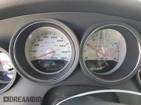 2008 Dodge Charger SRT-8 with VIN 2B3KA73W48H284076, listed as a Copart auction lot 48109825 with 156,174 mi miles and Salvage Title. Bid and sale history available at carsss.com. Image 9.