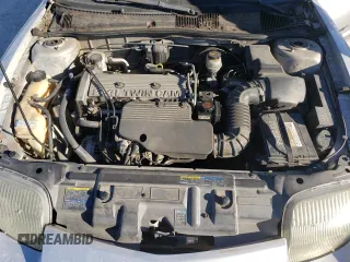 2002 Pontiac Sunfire z VIN 1G2JD12T627123970, wystawiony jako Copart lot #73338004 z przebiegiem 175 688 mil mil oraz Nie do naprawy. Historia ofert i sprzedaży dostępna na DreamBid. Obrazek 11.