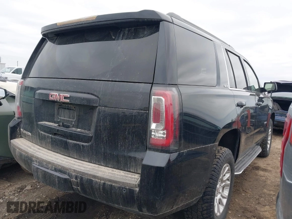 2016 GMC Yukon SLE with VIN 1GKS2AKC2GR357481, listed as a IAAI auction lot 41715909 with 165,377 mi miles. Bid and sale history available at carsss.com. Image 4.