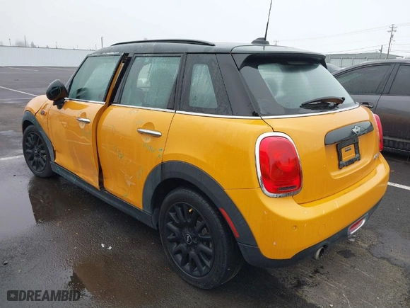 2018 MINI Hardtop 4 Door Cooper with VIN WMWXU1C59J2F79169, listed as a IAAI auction lot 40973679 with 97507 miles. Bid and sale history available at carsss.com. Image 3.
