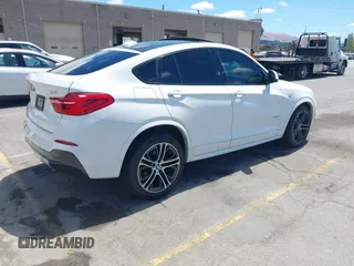 2015 BMW X4 xDrive28i with VIN 5UXXW3C5XF0M89147, listed as a IAAI auction lot 42779290 with 120,773 mi miles and . Bid and sale history available at DreamBid. Image 4.