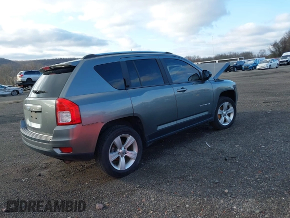 2012 Jeep Compass Sport with VIN 1C4NJDBB2CD577392, listed as a IAAI auction lot 41897809 with 20,801 mi miles. Bid and sale history available at carsss.com. Image 4.