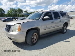 2007 GMC Yukon XL SLT z VIN 1GKFC16037R181233, wystawiony jako Copart lot #61639285 z przebiegiem 152 408 mil mil oraz Czysty tytuł • Clean title. Historia ofert i sprzedaży dostępna na DreamBid. Obrazek 1.