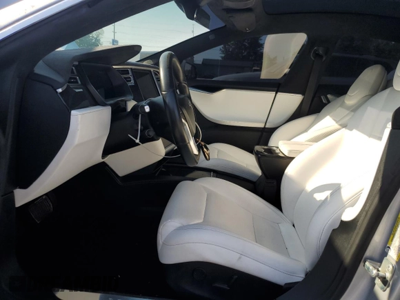 2017 Tesla Model S 60 with VIN 5YJSA1E15HF203248, listed as a Copart auction lot 54923855 with 84,214 mi miles and Salvage title. Bid and sale history available at DreamBid. Image 7.