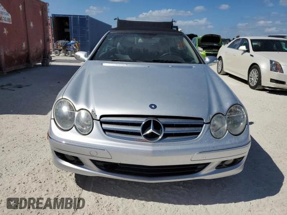 2007 Mercedes-Benz CLK-Class 3.5L with VIN WDBTK56FX7F206030, listed as a Copart auction lot 77271194 with 155,157 mi miles and Salvage Title. Bid and sale history available at carsss.com. Image 5.