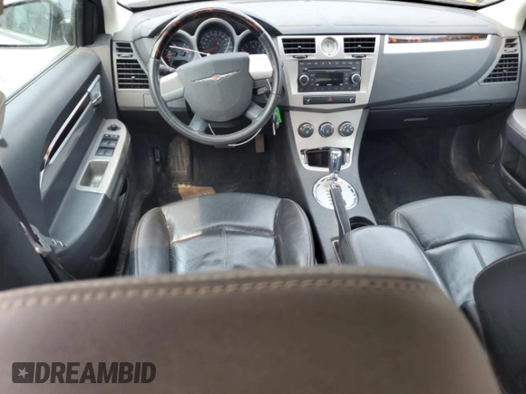 2010 Chrysler Sebring Limited with VIN 1C3CC5FB0AN233881, listed as a Copart auction lot 58819005 with 162,152 mi miles and Non repairable. Bid and sale history available at DreamBid. Image 8.