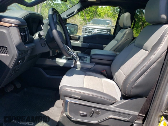 2022 Ford F-150 Lightning Pro z VIN 1FT6W1EV7NWG10033, wystawiony jako Copart lot #55569895 z przebiegiem 11 282 mil mil oraz Szkody całkowita. Historia ofert i sprzedaży dostępna na DreamBid. Obrazek 7.