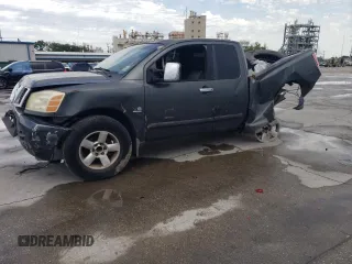 2004 Nissan Titan SE z VIN 1N6AA06A04N550130, wystawiony jako Copart lot #54357285 z przebiegiem Nie podano mil oraz Szkoda całkowita • Salvage title. Historia ofert i sprzedaży dostępna na DreamBid. Obrazek 1.
