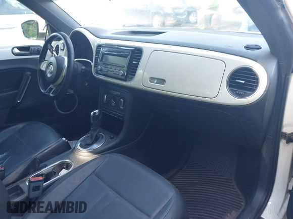2012 Volkswagen Beetle 2.5L w/Sound/Nav PZEV with VIN 3VWJP7AT1CM619318, listed as a IAAI auction lot 42223291 with 85,989 mi miles and . Bid and sale history available at DreamBid. Image 5.