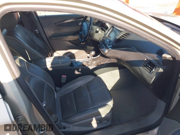 2014 Chevrolet Impala LTZ with VIN 2G1155S3XE9309815, listed as a IAAI auction lot 42039143 with 201,625 mi miles and . Bid and sale history available at DreamBid. Image 5.