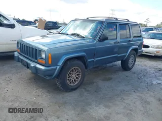 1998 Jeep Cherokee Sport with VIN 1J4FT68S0WL125382, listed as a IAAI auction lot 41551866 with 1 mi miles. Bid and sale history available at carsss.com. Image 2.