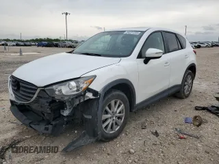 2016 Mazda CX-5 Touring z VIN JM3KE2CY7G0885399, wystawiony jako Copart lot #54231205 z przebiegiem 112 377 mil mil oraz Szkoda całkowita • Salvage title. Historia ofert i sprzedaży dostępna na DreamBid. Obrazek 1.