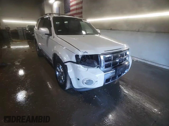 2012 Ford Escape Limited z VIN 1FMCU9EG3CKB88495, wystawiony jako Copart lot #80096324 z przebiegiem 382 892 mil mil oraz Szkoda całkowita • Salvage title. Historia ofert i sprzedaży dostępna na DreamBid. Obrazek 13.