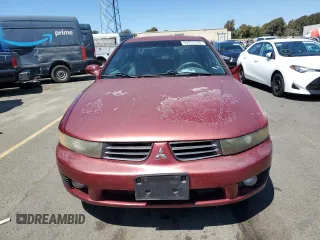 2002 Mitsubishi Galant ES z VIN 4A3AA46G12E090145, wystawiony jako Copart lot #68953104 z przebiegiem 135 395 mil mil oraz Szkody całkowita. Historia ofert i sprzedaży dostępna na DreamBid. Obrazek 5.