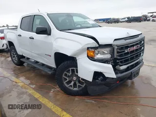 2021 GMC Canyon 4WD AT4 w/Leather with VIN 1GTG6FEN6M1154040, listed as a IAAI auction lot 41209527 with 29,484 mi miles. Bid and sale history available at carsss.com. Image 1.