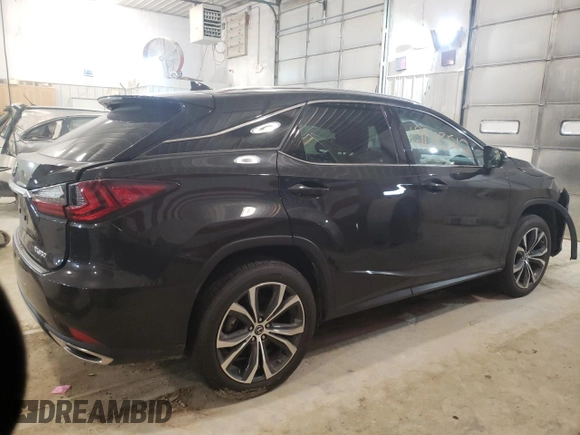 2022 Lexus RX with VIN 2T2HZMDA7NC331251, listed as a Copart auction lot 69643512 with 15,088 mi miles. Bid and sale history available at carsss.com. Image 3.