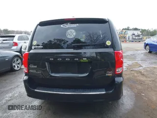 2015 Dodge Grand Caravan R/T with VIN 2C4RDGEGXFR718664, listed as a IAAI auction lot 41748958 with 239,277 mi miles and . Bid and sale history available at DreamBid. Image 16.