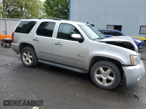 2010 Chevrolet Tahoe LTZ with VIN 1GNUKCE07AR223100, listed as a Copart auction lot 57439685 with 149,383 mi miles and Salvage title. Bid and sale history available at DreamBid. Image 4.