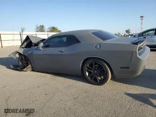 2012 Dodge Challenger SXT with VIN 2C3CDYAG7CH225015, listed as a Copart auction lot 51009695 with 120,915 mi miles and Salvage Title. Bid and sale history available at carsss.com. Image 2.