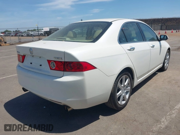 2004 Acura TSX w/Navigation with VIN JH4CL96924C024964, listed as a IAAI auction lot 42372283 with 206,892 mi miles and . Bid and sale history available at DreamBid. Image 4.