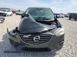 2016 Mazda CX-5 Touring with VIN JM3KE4CY5G0667179, listed as a Copart auction lot 49414625 with 90,155 mi miles and Salvage Title. Bid and sale history available at carsss.com. Image 5.