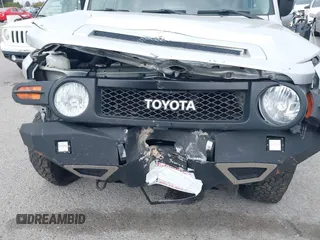 2007 Toyota FJ Cruiser with VIN JTEBU11F370036941, listed as a IAAI auction lot 42024330 with 164,703 mi miles. Bid and sale history available at carsss.com. Image 6.