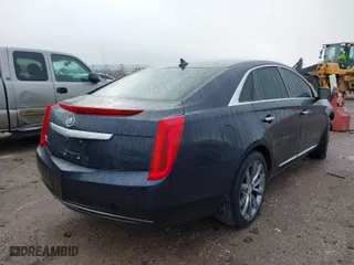 2013 Cadillac XTS with VIN 2G61N5S38D9163214, listed as a IAAI auction lot 41172272 with 167,309 mi miles. Bid and sale history available at carsss.com. Image 4.