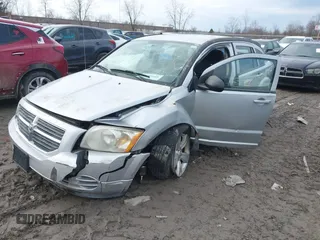 2010 Dodge Caliber SXT z VIN 1B3CB4HA0AD575917, wystawiony jako IAAI lot #41709405 z przebiegiem 213 641 mil mil oraz . Historia ofert i sprzedaży dostępna na DreamBid. Obrazek 2.
