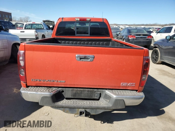 2009 GMC Canyon Work Truck z VIN 1GTDT19EX98142609, wystawiony jako Copart lot #46698275 z przebiegiem 74 910 mil mil oraz Szkoda całkowita • Salvage title. Historia ofert i sprzedaży dostępna na DreamBid. Obrazek 6.
