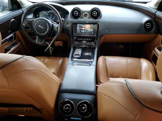 2015 Jaguar XJ Portfolio with VIN SAJWJ2GD2F8V90287, listed as a Copart auction lot 50291095 with 46,917 mi miles and Salvage title. Bid and sale history available at DreamBid. Image 8.