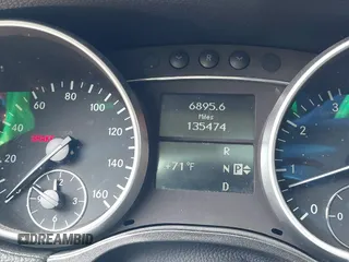 2009 Mercedes-Benz GL-Class 5.5L with VIN 4JGBF86E29A530952, listed as a IAAI auction lot 42112828 with 135,474 mi miles. Bid and sale history available at carsss.com. Image 7.