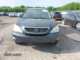 2008 Lexus RX with VIN 2T2HK31U28C063629, listed as a IAAI auction lot 42174790 with 204,595 mi miles. Bid and sale history available at carsss.com. Image 12.