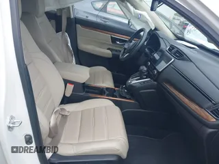 2021 Honda CR-V Touring with VIN 5J6RW2H93ML012016, listed as a IAAI auction lot 42365715 with 55,114 mi miles and . Bid and sale history available at DreamBid. Image 5.