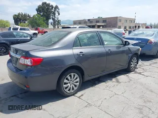 2013 Toyota Corolla L with VIN JTDBU4EE2DJ113876, listed as a IAAI auction lot 42044548 with 232,500 mi miles. Bid and sale history available at carsss.com. Image 4.