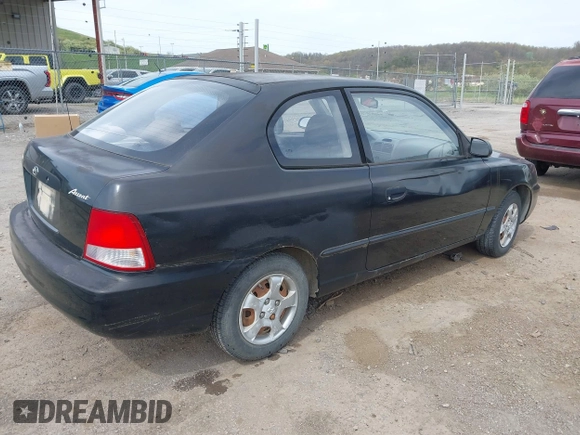 2000 Hyundai Accent z VIN KMHCF35G5YU017900, wystawiony jako IAAI lot #42063663 z przebiegiem 170 283 mil mil oraz . Historia ofert i sprzedaży dostępna na DreamBid. Obrazek 4.