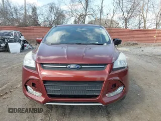2016 Ford Escape SE with VIN 1FMCU0G75GUB22209, listed as a IAAI auction lot 41864084 with 96,313 mi miles. Bid and sale history available at carsss.com. Image 12.