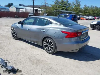 2017 Nissan Maxima SR with VIN 1N4AA6AP4HC453943, listed as a IAAI auction lot 41888527 with 130,577 mi miles. Bid and sale history available at carsss.com. Image 3.