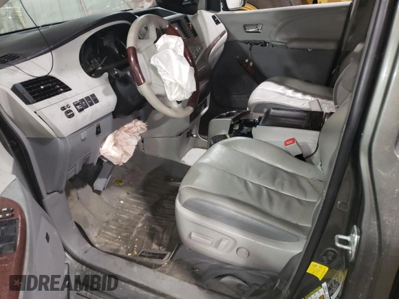2012 Toyota Sienna XLE с VIN 5TDDK3DC3CS040365, выставлен на аукционе Copart как лот 63818815 с пробегом Не указан миль и Списание • Salvage title. История ставок и продаж доступна на DreamBid. Изображение 7.