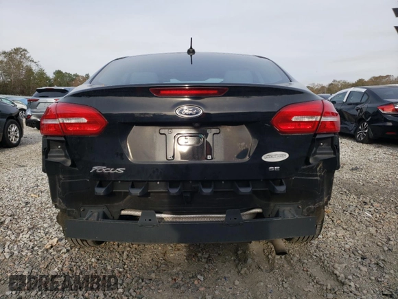 2017 Ford Focus SE with VIN 1FADP3F26HL221366, listed as a Copart auction lot 83308964 with 100,395 mi miles and Salvage Title. Bid and sale history available at carsss.com. Image 6.