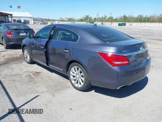 2014 Buick LaCrosse Leather with VIN 1G4GB5G37EF204977, listed as a IAAI auction lot 41844078 with 104,773 mi miles. Bid and sale history available at carsss.com. Image 3.
