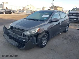 2014 Hyundai Accent GS with VIN KMHCT5AE6EU165851, listed as a IAAI auction lot 41313636 with 161,054 mi miles. Bid and sale history available at carsss.com. Image 2.