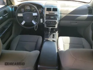2010 Dodge Charger with VIN 2B3CA4CD8AH146922, listed as a Copart auction lot 77013754 with 131,822 mi miles and Salvage Title. Bid and sale history available at carsss.com. Image 8.