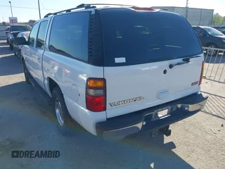 2001 GMC Yukon XL SLT with VIN 3GKEC16TX1G265630, listed as a IAAI auction lot 40869322 with 284,692 mi miles. Bid and sale history available at carsss.com. Image 3.
