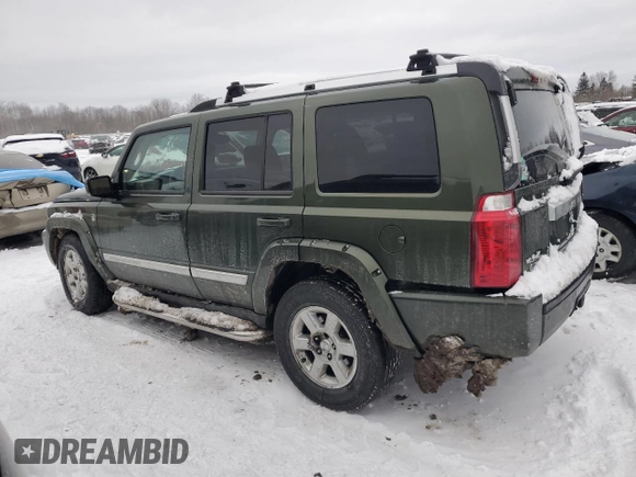 2007 Jeep Commander Overland with VIN 1J8HG68247C555994, listed as a Copart auction lot 86903914 with 219,294 mi miles and Salvage title. Bid and sale history available at DreamBid. Image 2.